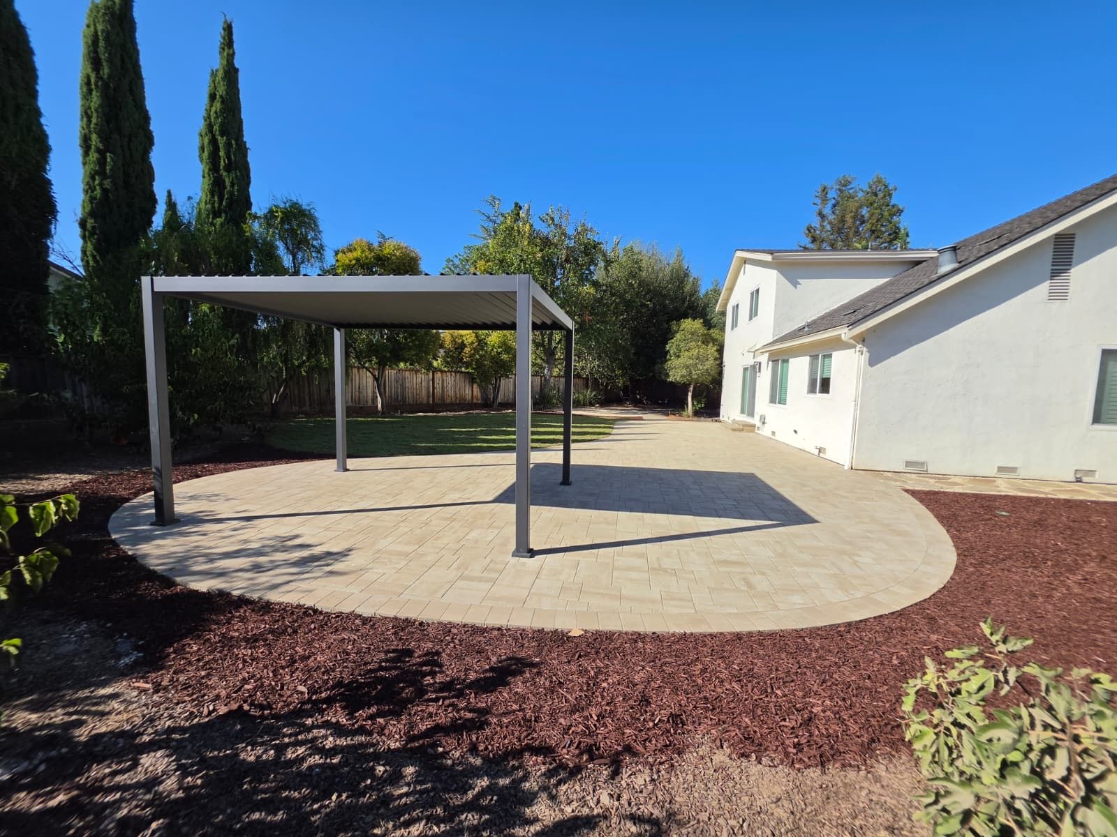 Backyard paver patio and pergola project completed by Garescape in San Jose
